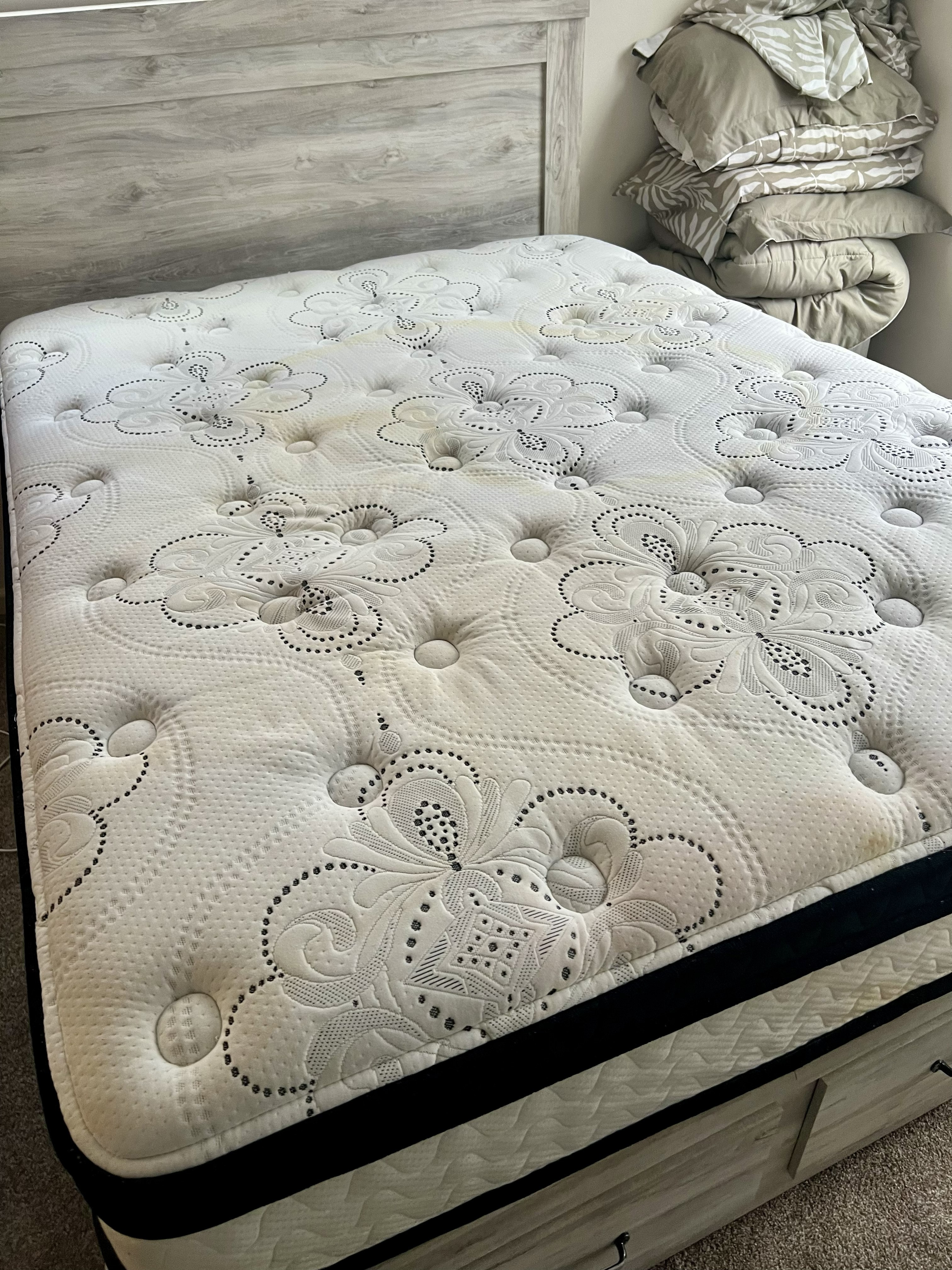 Mattress before professional upholstery cleaning in Jacksonville, FL